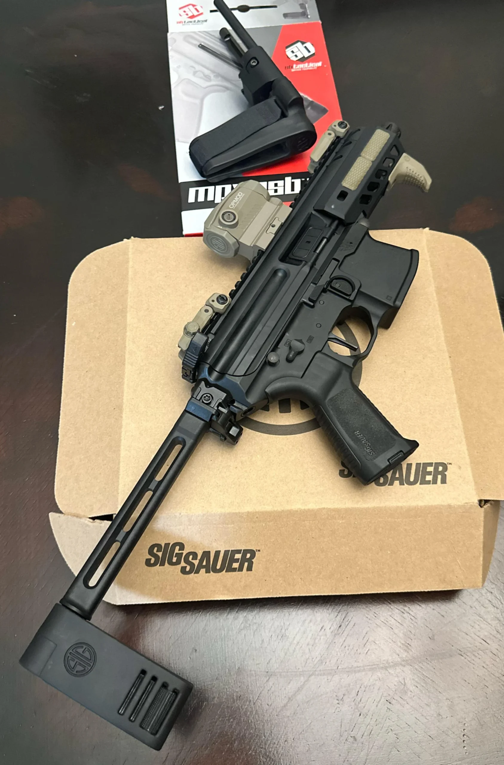 update-on-new-2024-sig-brace-v0-kebblykrmdqc1 SIG Sauer MPX K Pistol 9mm Luger 4.5″ barrel with PCP folding brace 30‑round polymer black